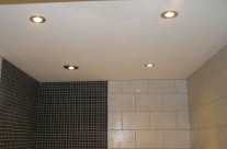Four low energy spotlights (one including built in extractor fan) fitted